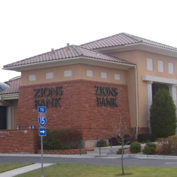 Hip and valley styled roof on commercial project for zions bank in southern utah by stout roofing.