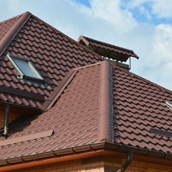 Sky lights in tiled roof by stout roofing.